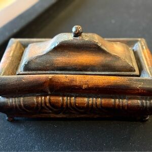 Brown and Black Decorative Wooden Box with Carved Details